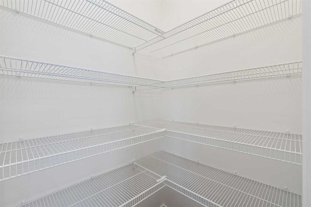 1030 Bayview Crescent Sw, Airdrie, AB - Indoor With Storage
