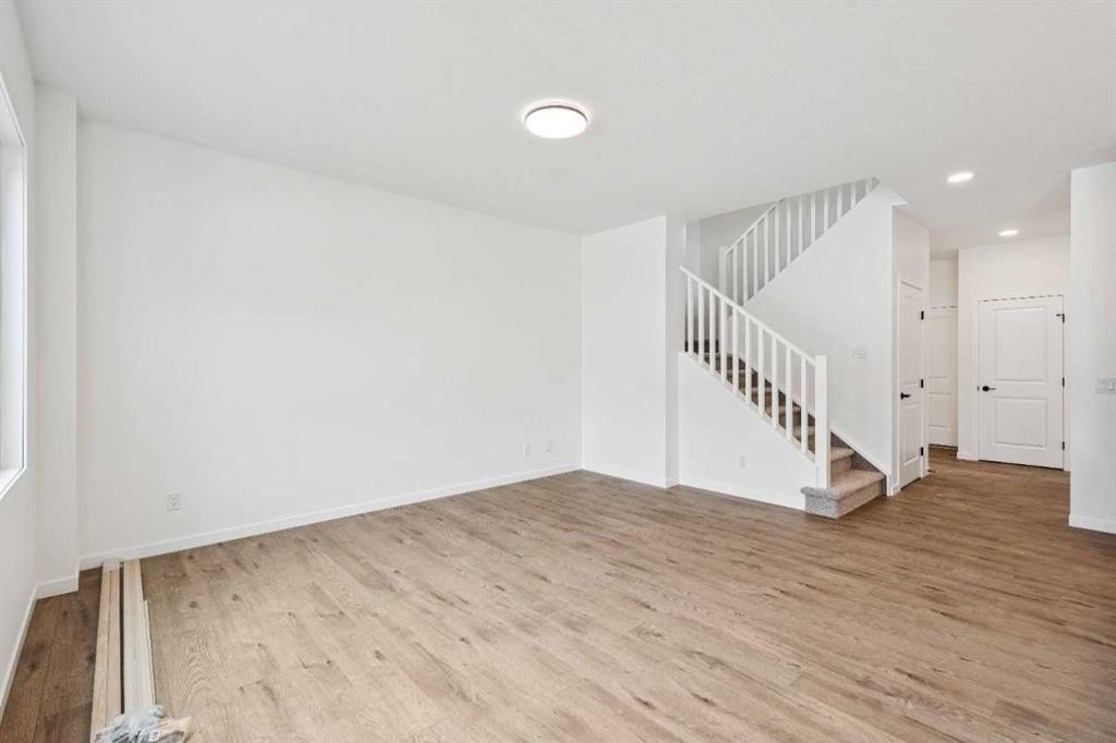 1030 Bayview Crescent Sw, Airdrie, AB - Indoor Photo Showing Other Room