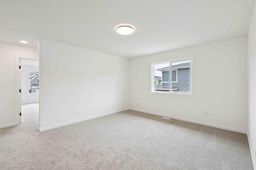 1030 Bayview Crescent Sw, Airdrie, AB - Indoor Photo Showing Other Room
