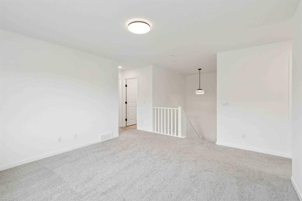 1030 Bayview Crescent Sw, Airdrie, AB - Indoor Photo Showing Other Room