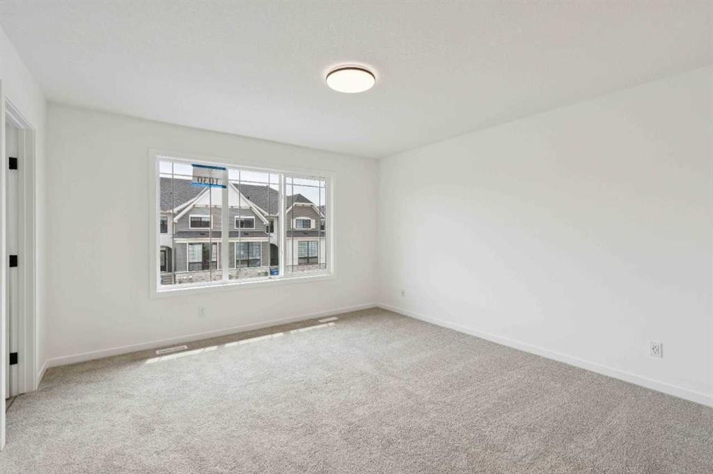 1030 Bayview Crescent Sw, Airdrie, AB - Indoor Photo Showing Other Room