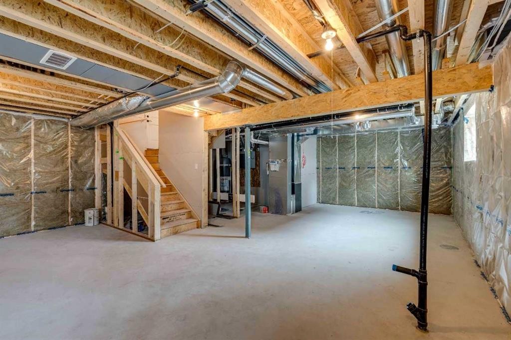 1030 Bayview Crescent Sw, Airdrie, AB - Indoor Photo Showing Basement