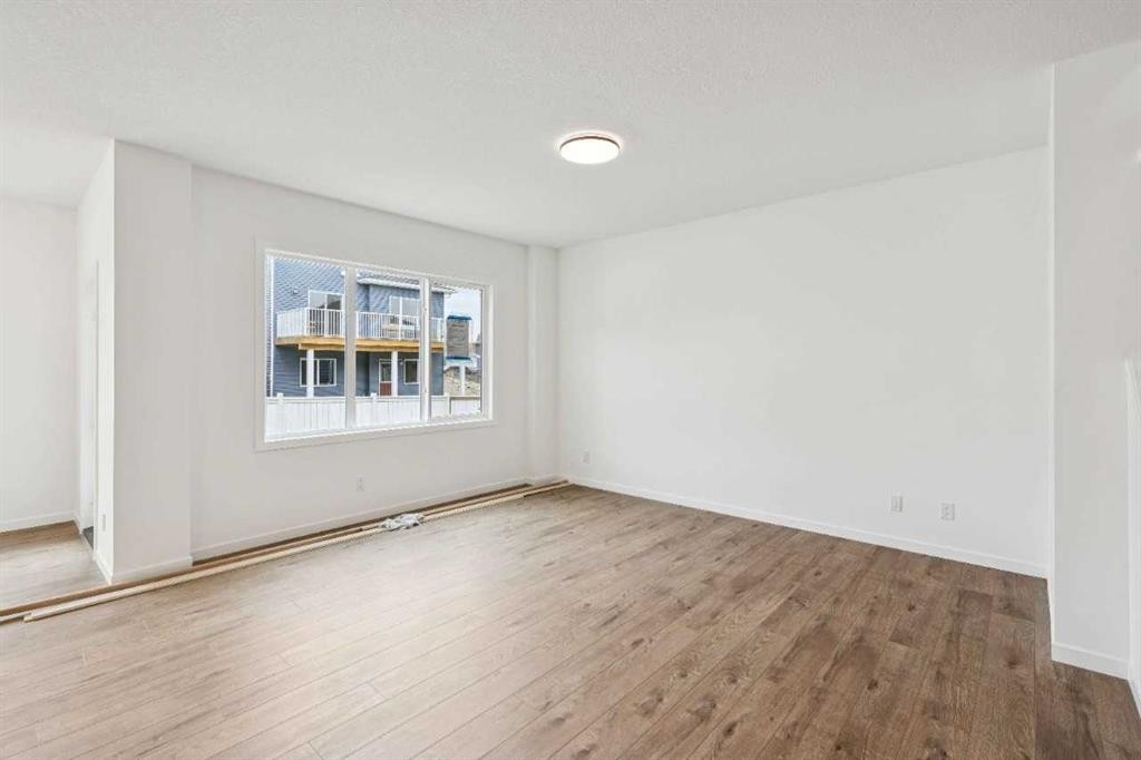 1030 Bayview Crescent Sw, Airdrie, AB - Indoor Photo Showing Other Room