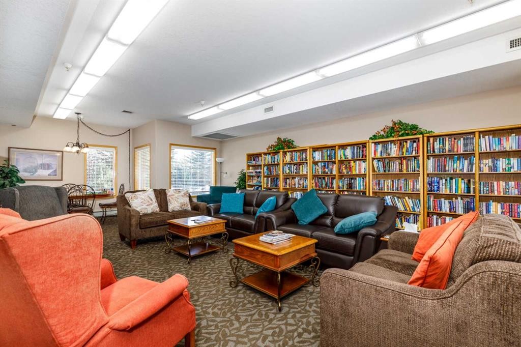 105-4512 52 Avenue, Red Deer, AB - Indoor Photo Showing Living Room
