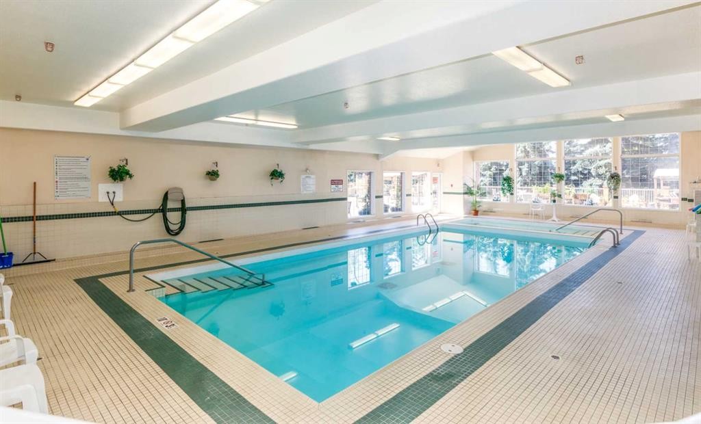 105-4512 52 Avenue, Red Deer, AB - Indoor Photo Showing Other Room With In Ground Pool