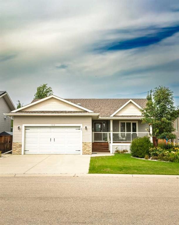 128 12 Ave Ne, Sundre, AB - Outdoor With Deck Patio Veranda