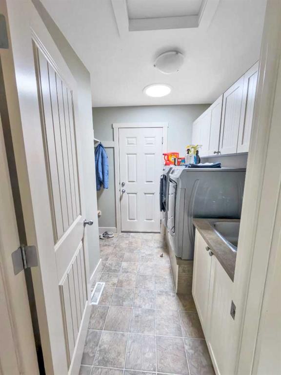 128 12 Ave Ne, Sundre, AB - Indoor Photo Showing Laundry Room