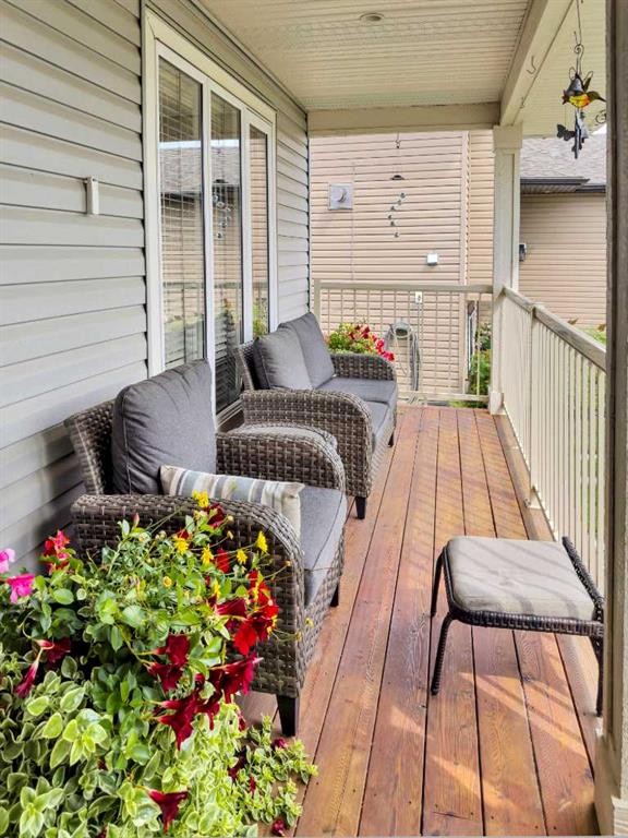 128 12 Ave Ne, Sundre, AB - Outdoor With Deck Patio Veranda With Exterior