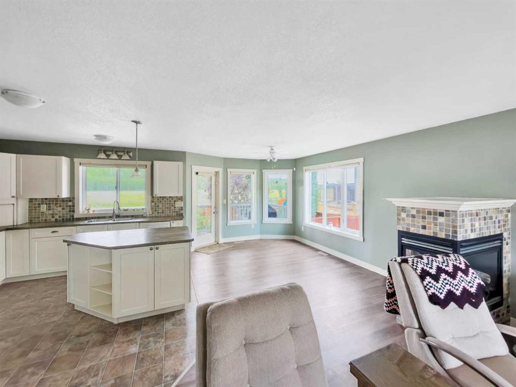 128 12 Ave Ne, Sundre, AB - Indoor With Fireplace