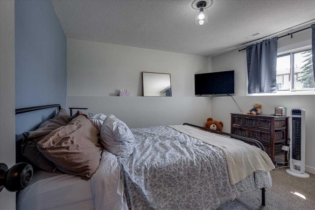 22 Greenham Drive, Red Deer, AB - Indoor Photo Showing Bedroom