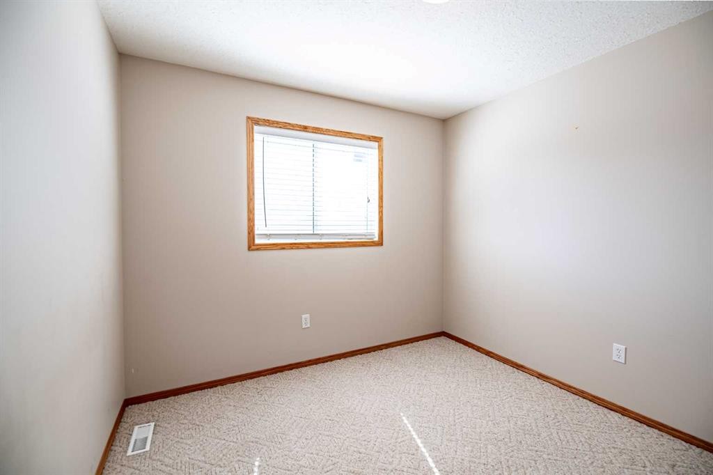 19 Fulmar Close, Sylvan Lake, AB - Indoor Photo Showing Other Room