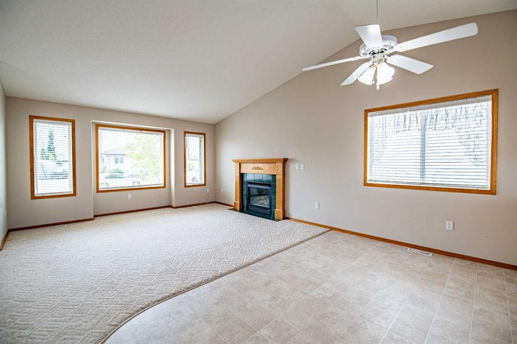 19 Fulmar Close, Sylvan Lake, AB - Indoor With Fireplace
