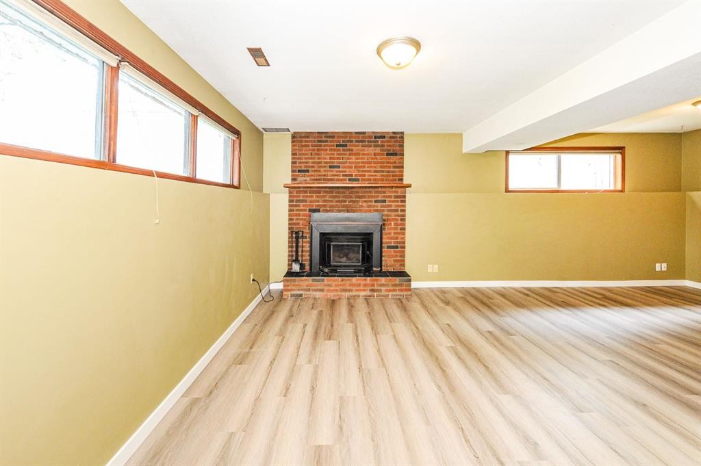 68 Elliott Drive, Camrose, AB - Indoor With Fireplace