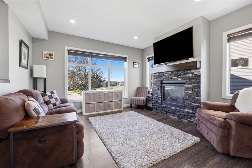 206 Truant Crescent, Red Deer, AB - Indoor Photo Showing Living Room With Fireplace