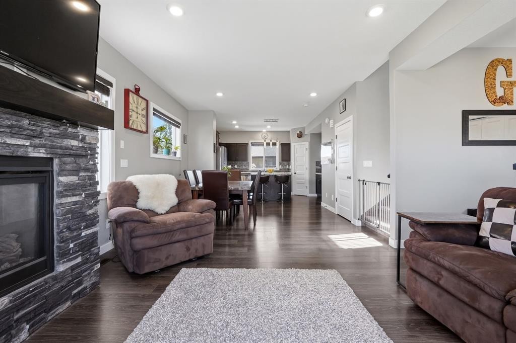 206 Truant Crescent, Red Deer, AB - Indoor Photo Showing Living Room With Fireplace