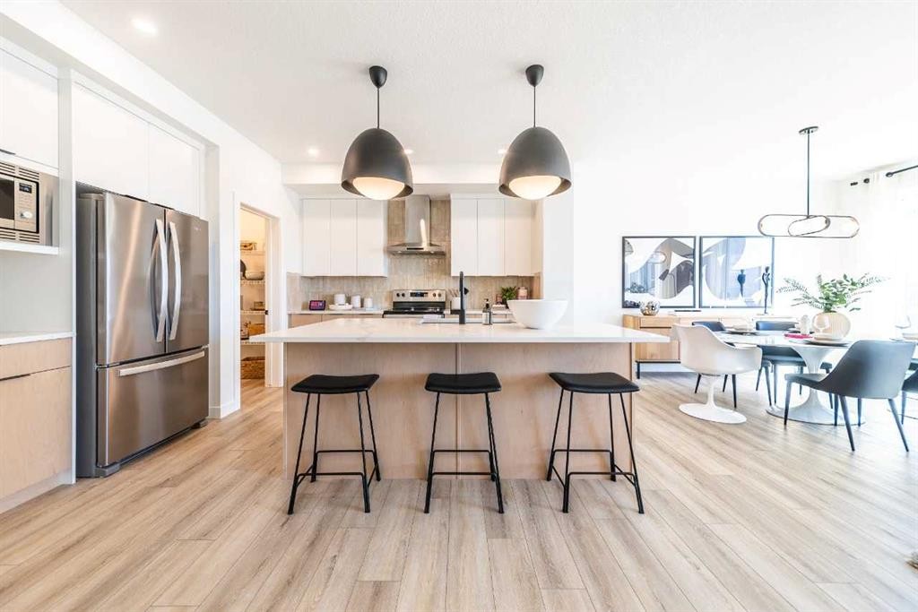 381 Sora Park Se, Calgary, AB - Indoor Photo Showing Kitchen With Stainless Steel Kitchen With Upgraded Kitchen