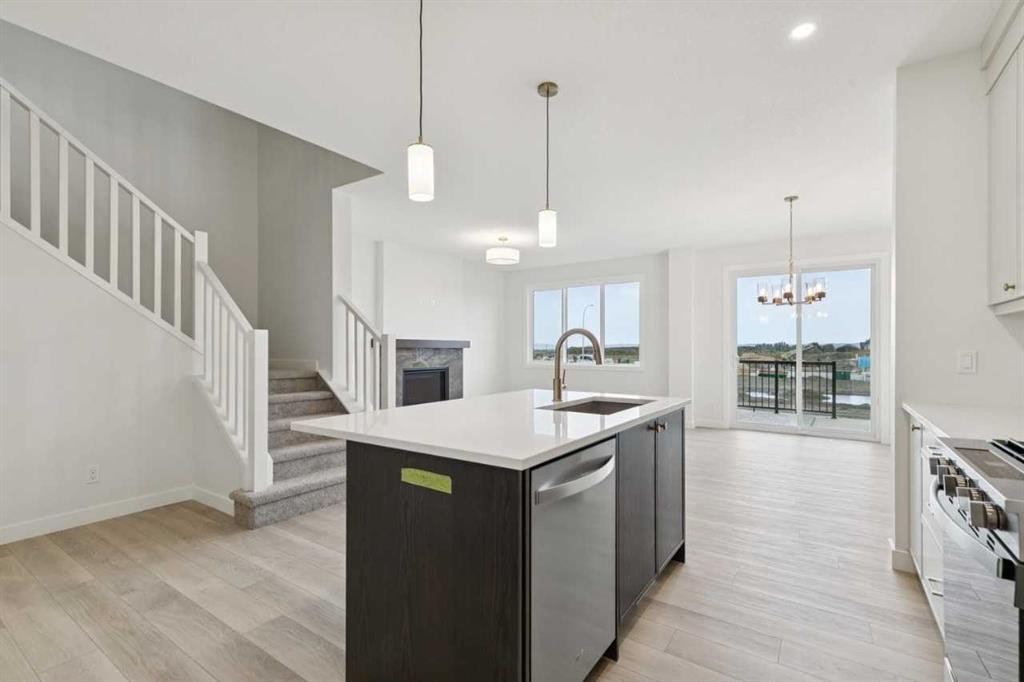 139 Fireside Close, Cochrane, AB - Indoor Photo Showing Kitchen With Upgraded Kitchen