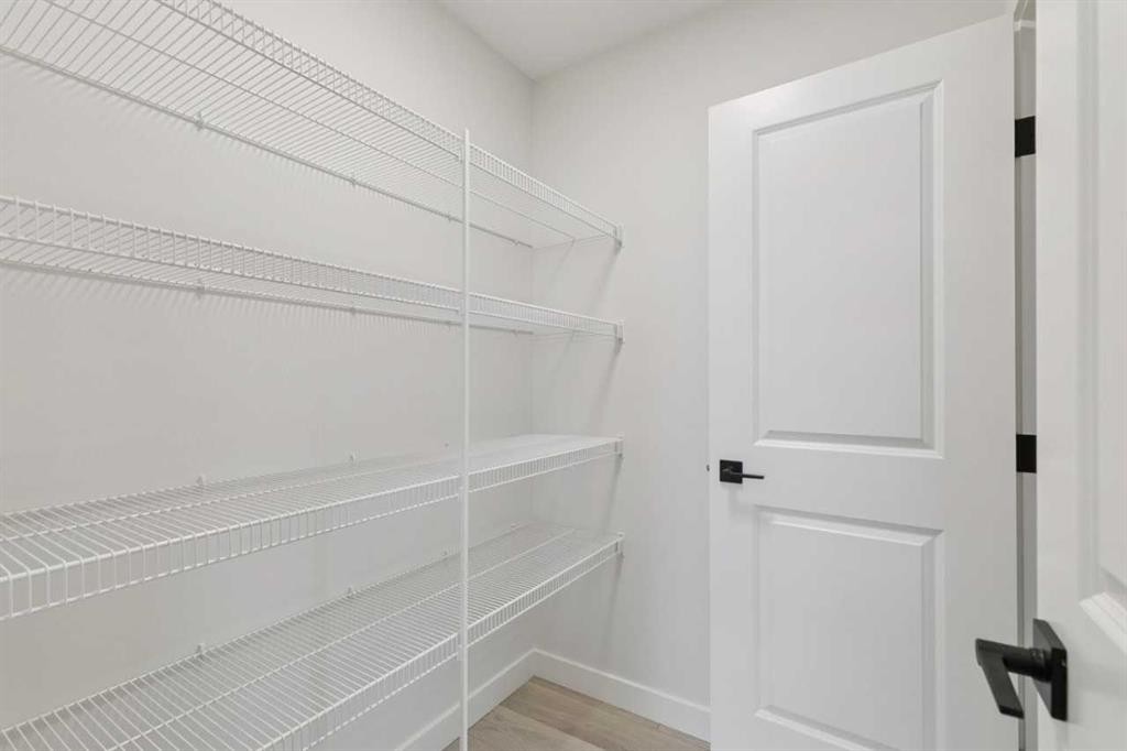 139 Fireside Close, Cochrane, AB - Indoor With Storage