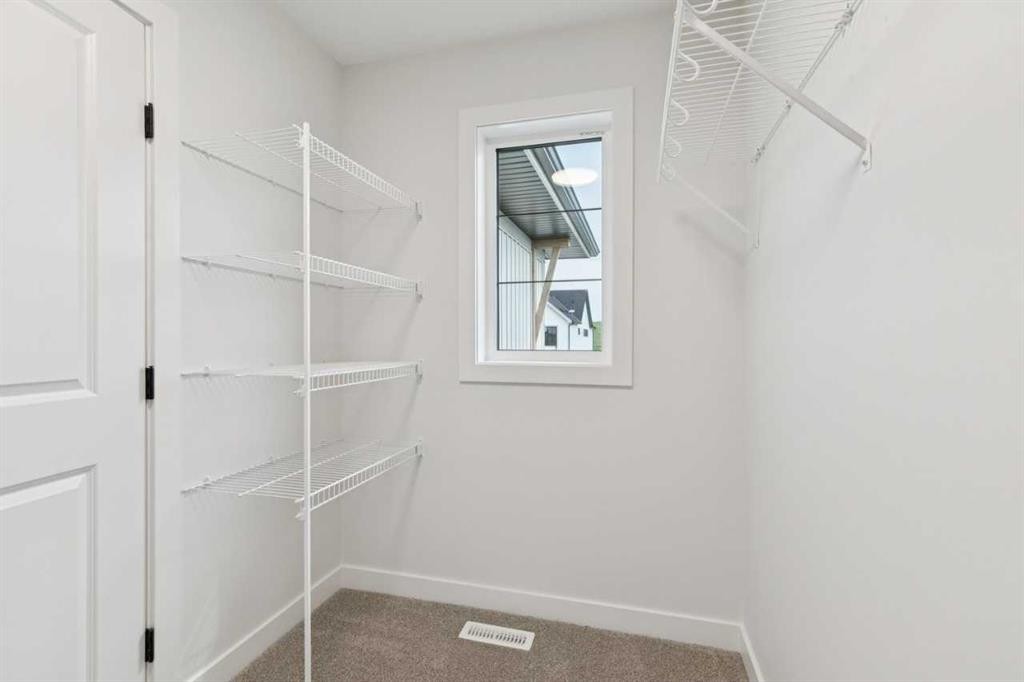 139 Fireside Close, Cochrane, AB - Indoor With Storage