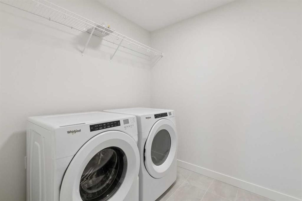 139 Fireside Close, Cochrane, AB - Indoor Photo Showing Laundry Room