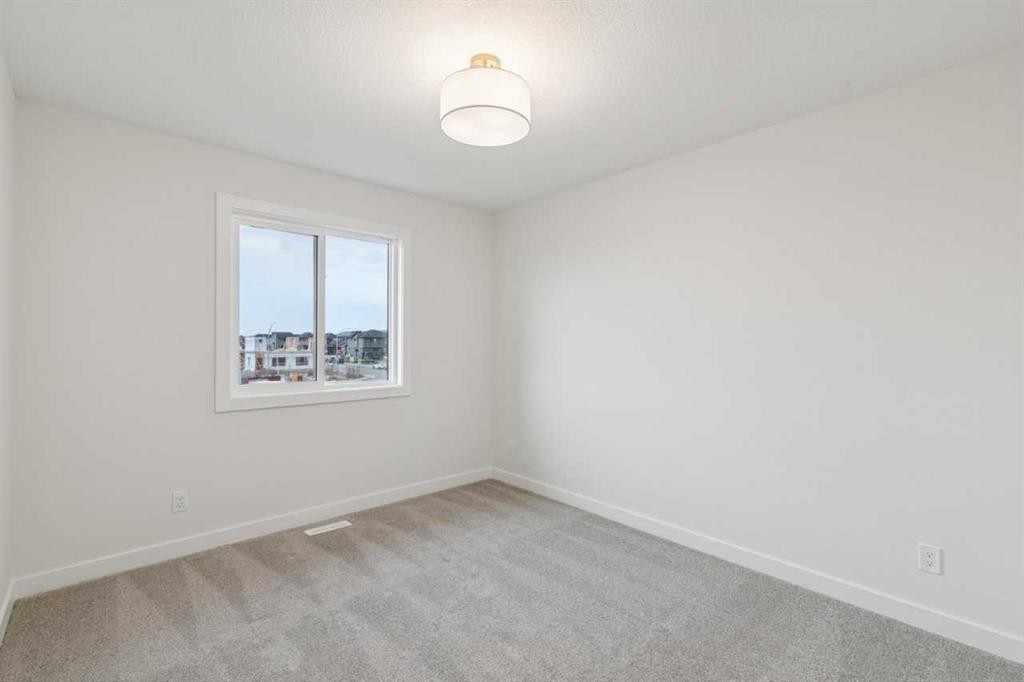 139 Fireside Close, Cochrane, AB - Indoor Photo Showing Other Room