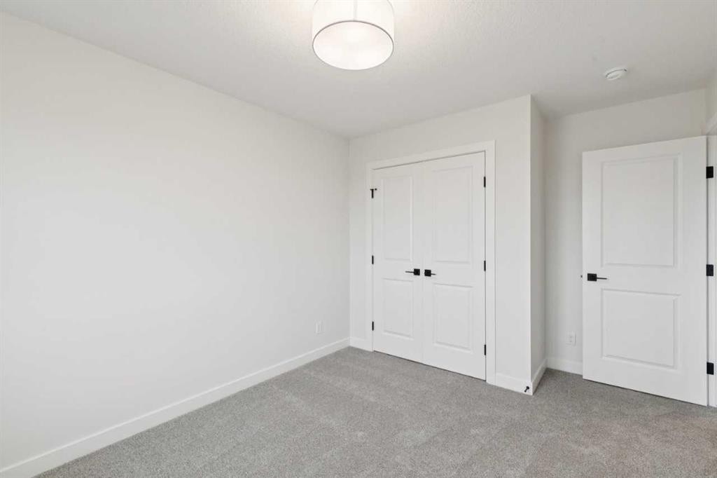 139 Fireside Close, Cochrane, AB - Indoor Photo Showing Other Room