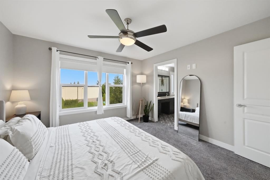 137 Hampton Crescent, Sylvan Lake, AB - Indoor Photo Showing Bedroom