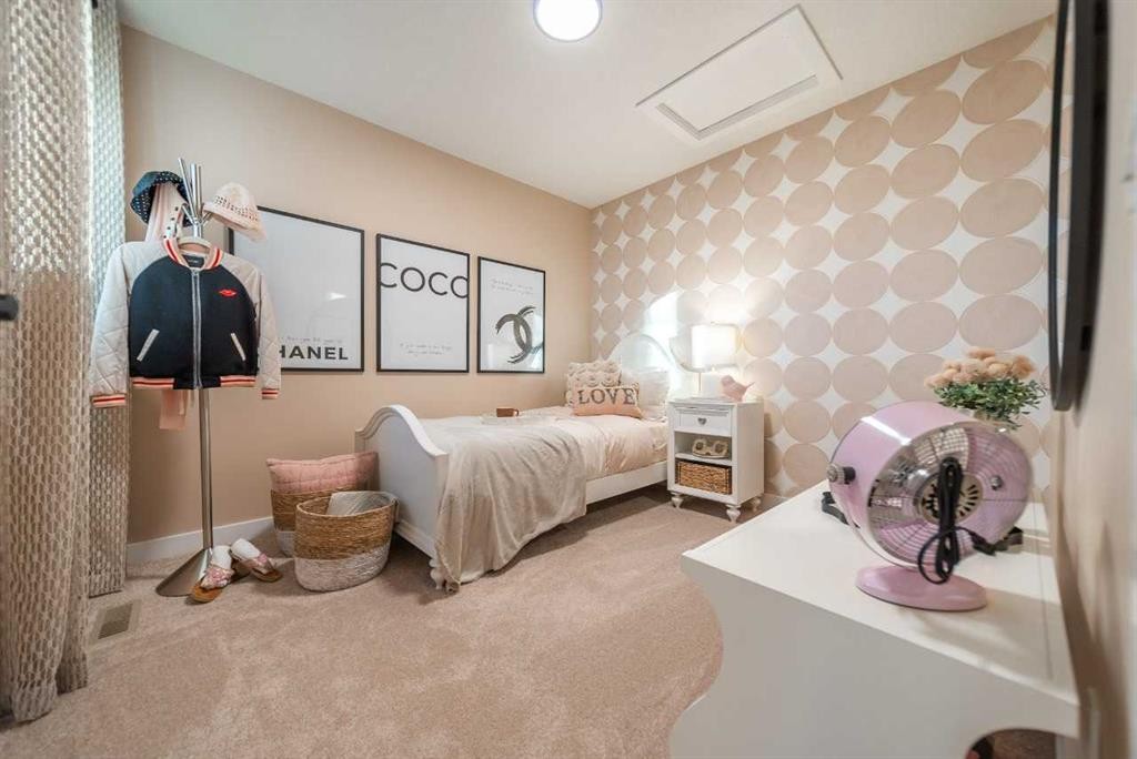 52 Southborough Common, Cochrane, AB - Indoor Photo Showing Bedroom