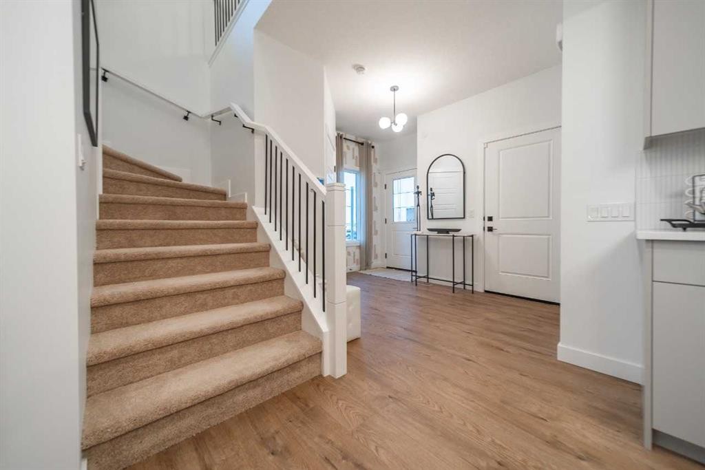 52 Southborough Common, Cochrane, AB - Indoor Photo Showing Other Room