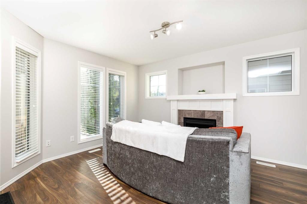 1006-30 Carleton Avenue, Red Deer, AB - Indoor Photo Showing Bedroom With Fireplace