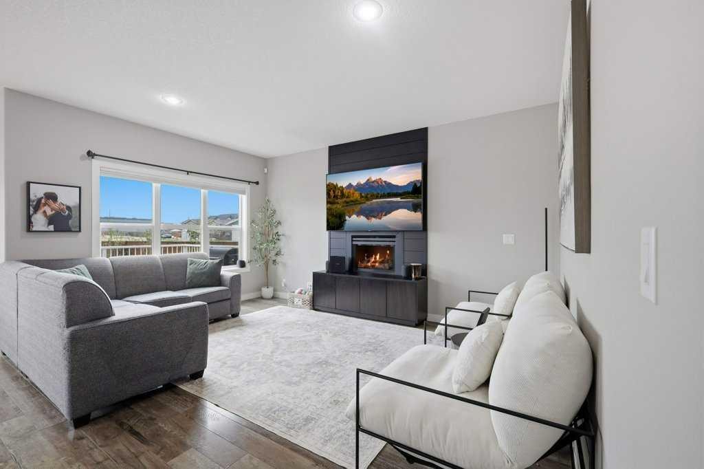 3 Craig Road, Sylvan Lake, AB - Indoor Photo Showing Living Room With Fireplace