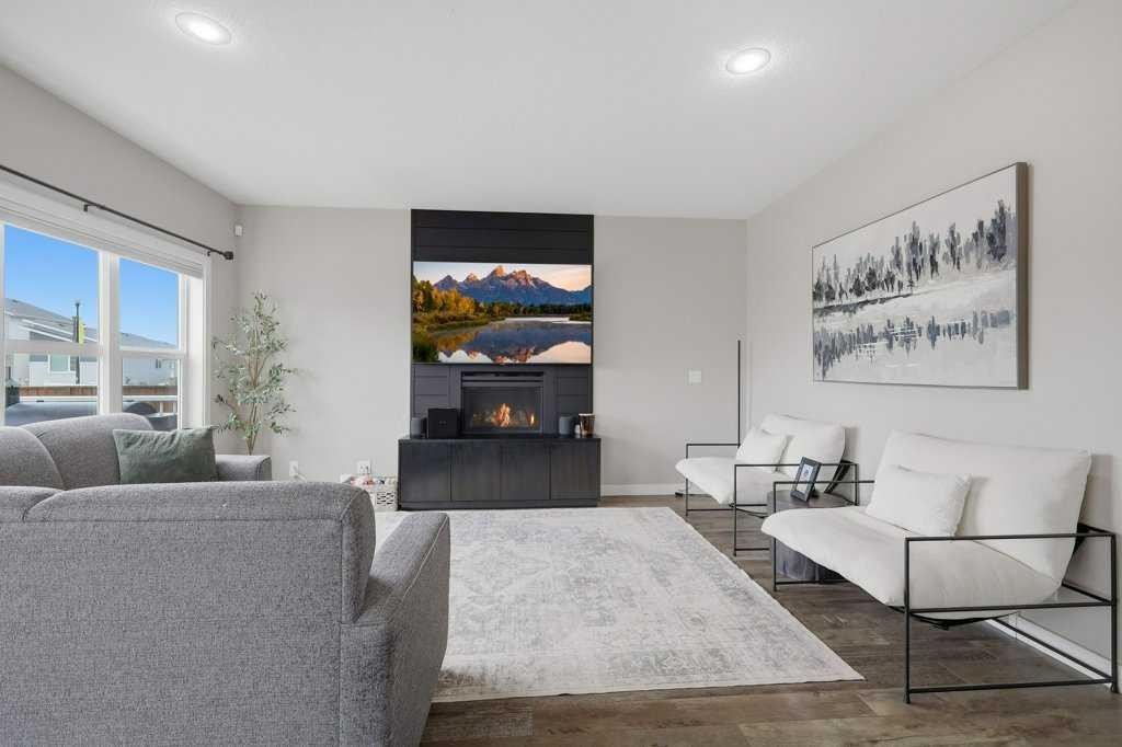 3 Craig Road, Sylvan Lake, AB - Indoor Photo Showing Living Room With Fireplace