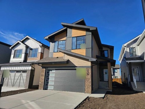 119 Heritage Ridge  Cochrane, AB T4C 2J8