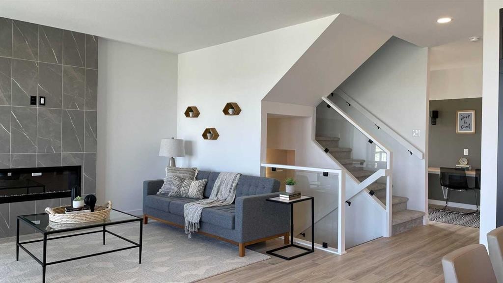 401 Blackwolf Boulevard North, Lethbridge, AB - Indoor Photo Showing Living Room With Fireplace