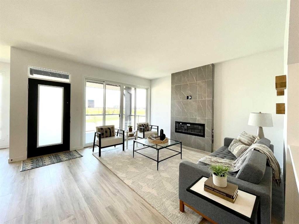 401 Blackwolf Boulevard North, Lethbridge, AB - Indoor Photo Showing Living Room With Fireplace
