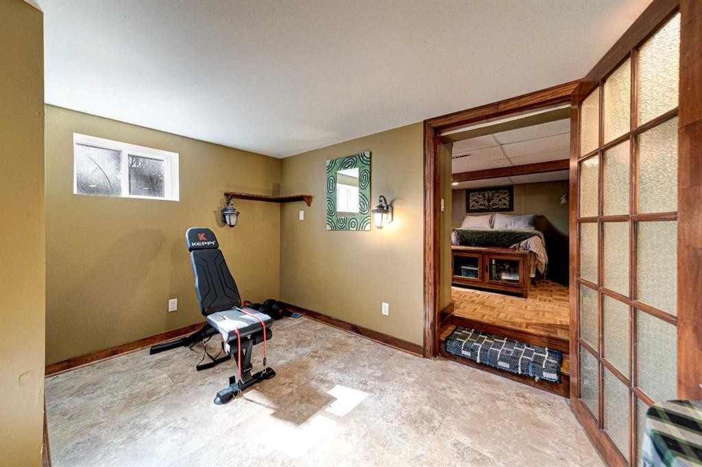 7806 20 Avenue, Coleman, AB - Indoor Photo Showing Gym Room