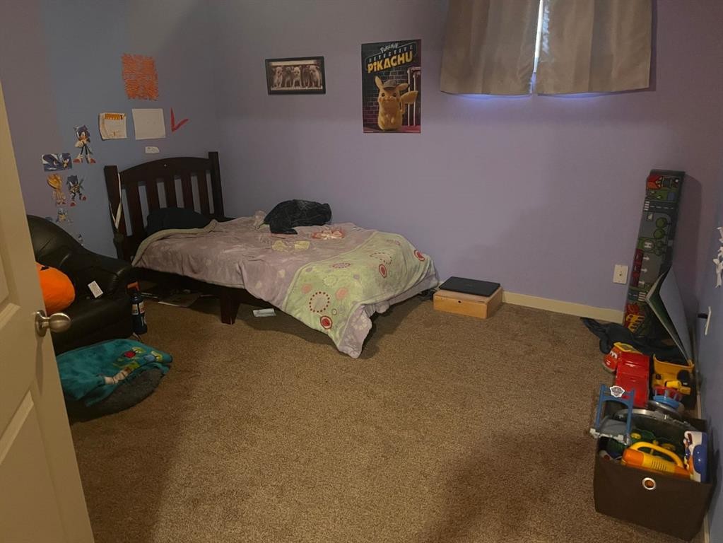 939 2Nd Avenue North, Vauxhall, AB - Indoor Photo Showing Bedroom