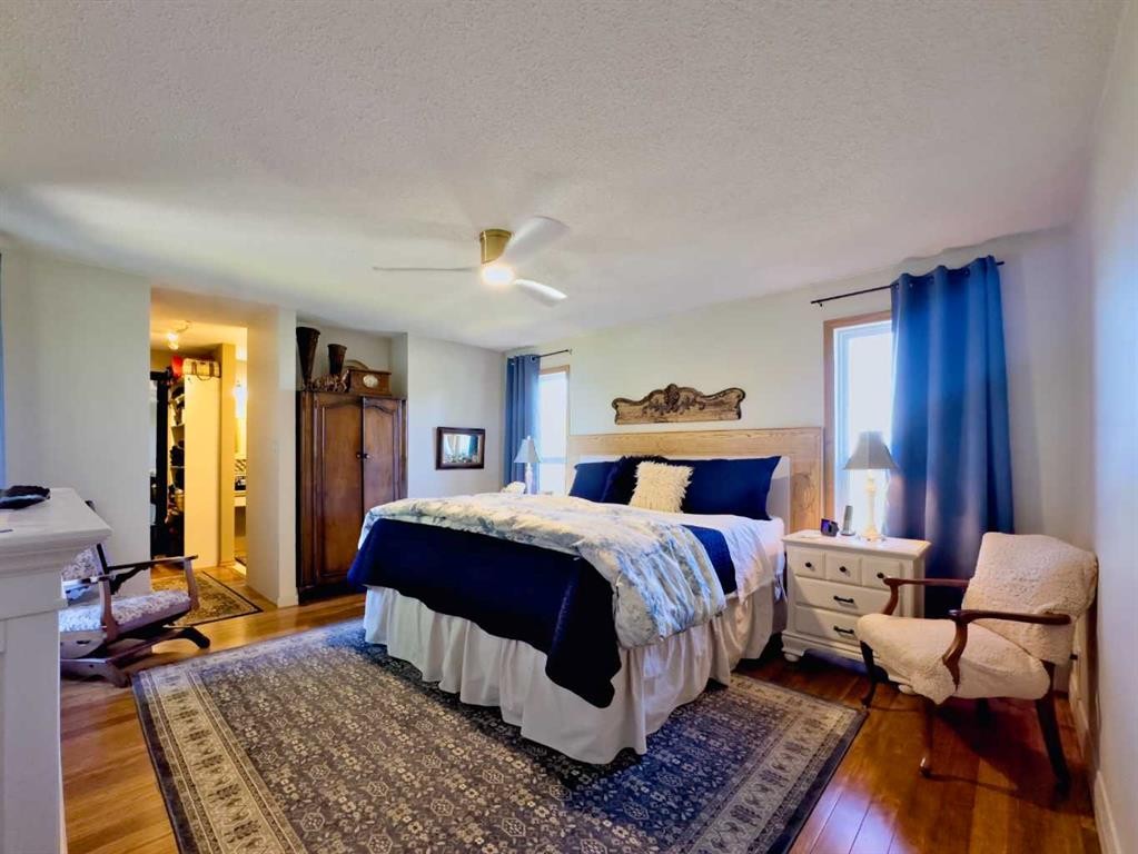 42082 Range Road 274, Hill Spring, AB - Indoor Photo Showing Bedroom