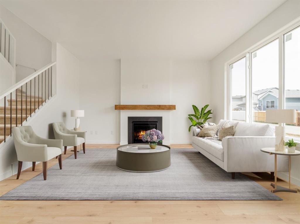2528 43 Street South, Lethbridge, AB - Indoor Photo Showing Living Room With Fireplace