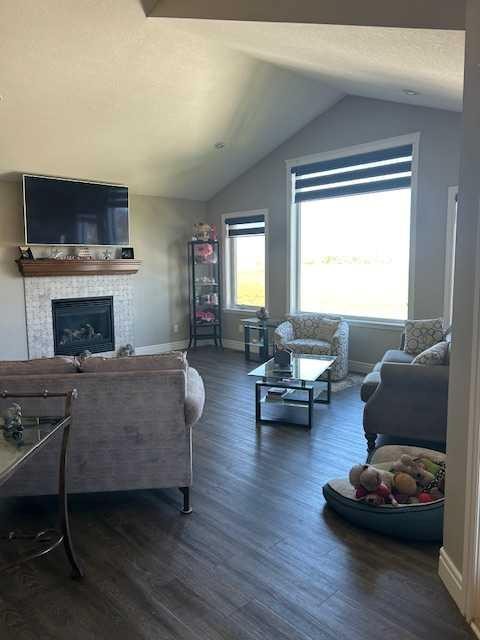 61 Westview Boulevard, Taber, AB - Indoor Photo Showing Living Room With Fireplace