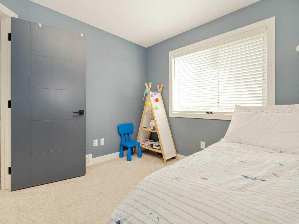 660 Aquitania Boulevard West, Lethbridge, AB - Indoor Photo Showing Bedroom