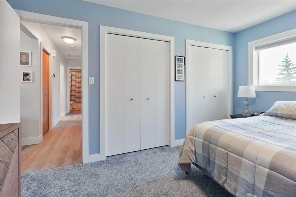 486N 100E, Raymond, AB - Indoor Photo Showing Bedroom