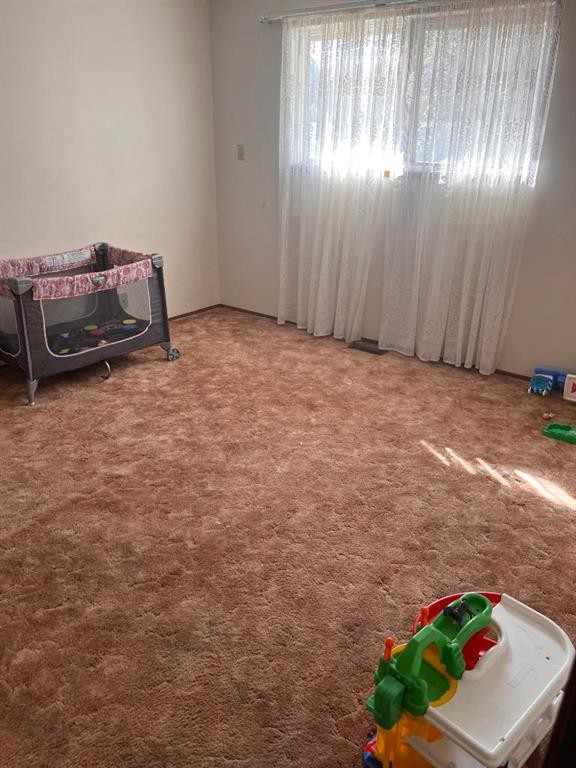 409 Main Street Nw, Milk River, AB - Indoor Photo Showing Other Room