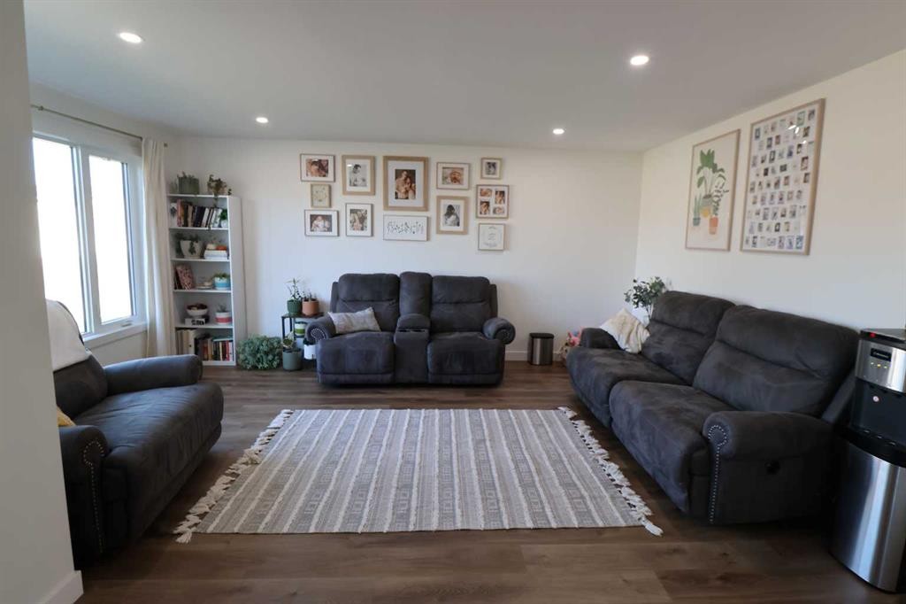 5707 50 St, Taber, AB - Indoor Photo Showing Living Room