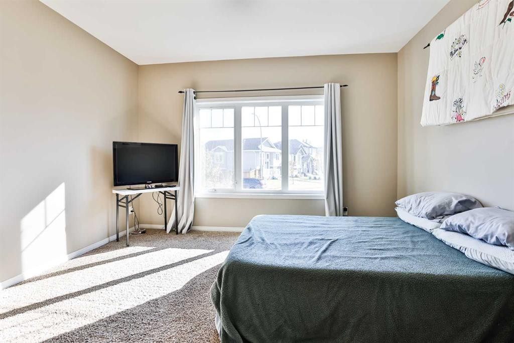887 Keystone Meadows West, Lethbridge, AB - Indoor Photo Showing Bedroom