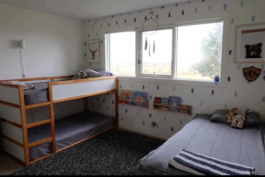 222041 Rge Rd 52, Magrath, AB - Indoor Photo Showing Bedroom