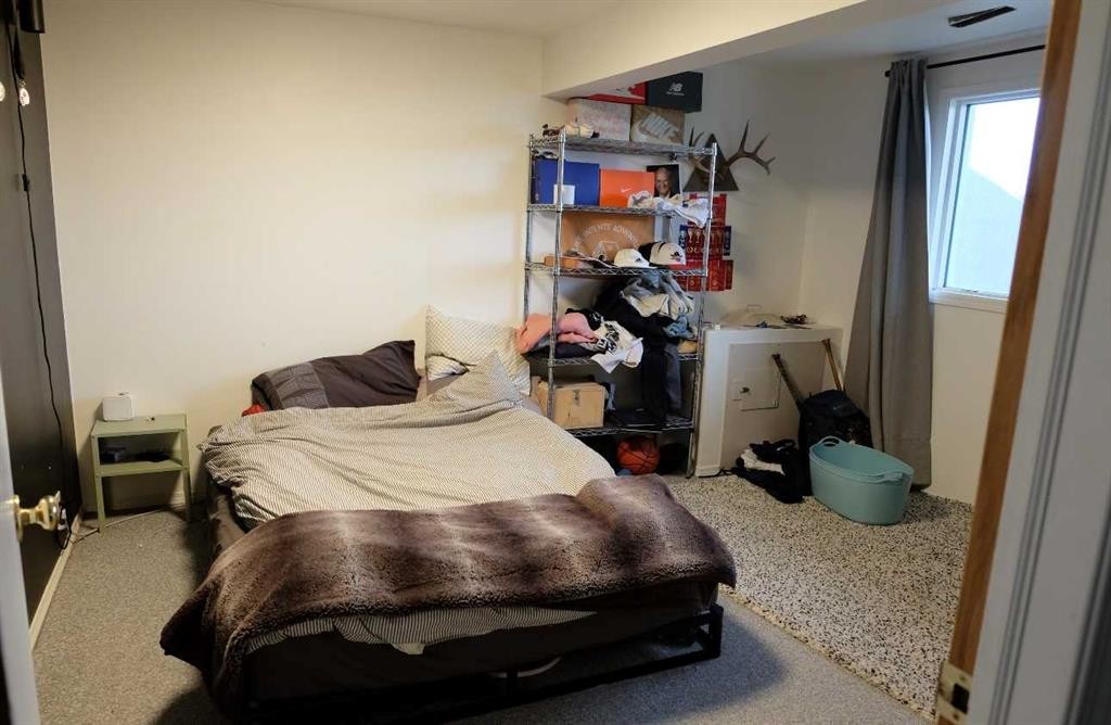 222041 Rge Rd 52, Magrath, AB - Indoor Photo Showing Bedroom
