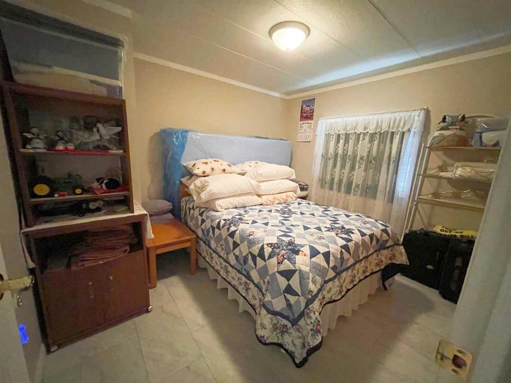 331 Armstrong Street, Carmangay, AB - Indoor Photo Showing Bedroom