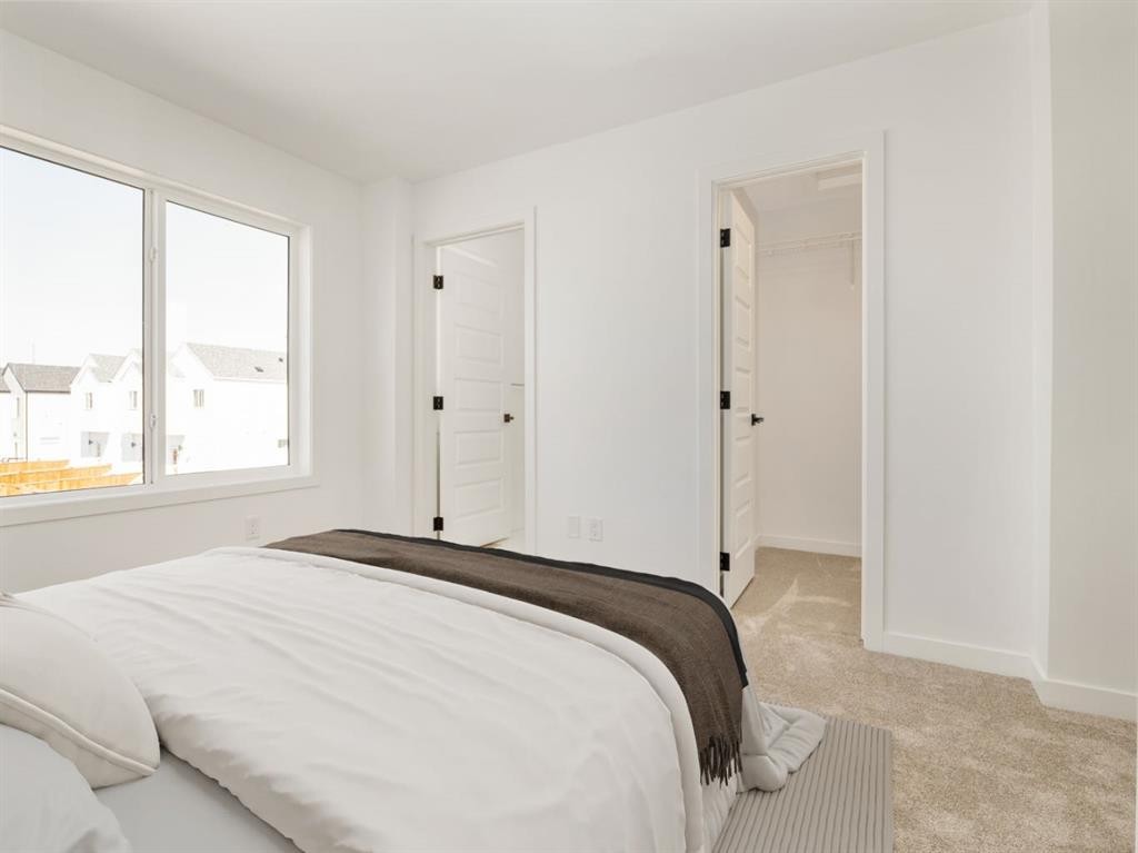 669 Blackwolf Boulevard North, Lethbridge, AB - Indoor Photo Showing Bedroom