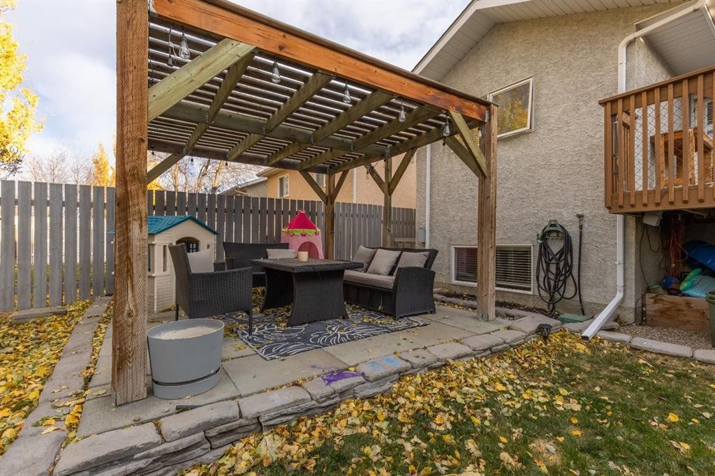 66 Assiniboia Way West, Lethbridge, AB - Outdoor With Deck Patio Veranda With Exterior